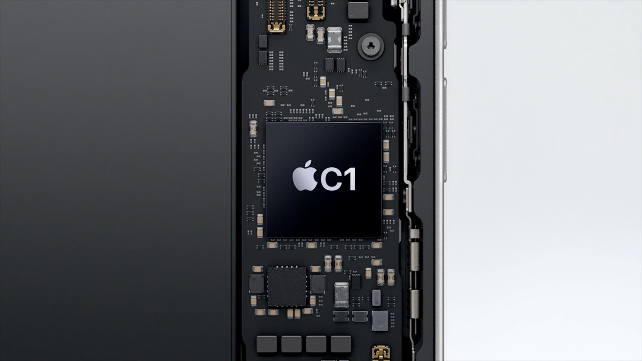 Close-up view of a smartphone's internal components featuring a circuit board with a large central chip labeled with an Apple logo and 'C1'.